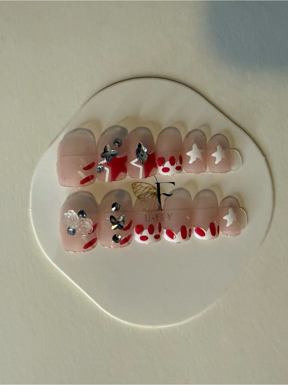 Attractive Press-On Nail Set in Nude with Red & White Accents